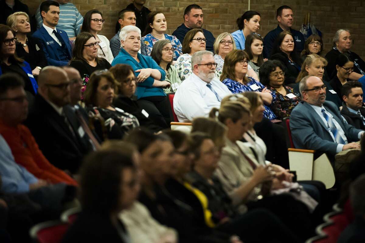 Northwood University faculty and staff listen during an event announcing Dr. Kent MacDonald as the incoming President of the university on Thursday, April 18, 2019. (Katy Kildee/kkildee@mdn.net)