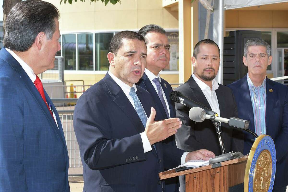 Officials from Laredo and Nuevo Laredo held a news conference Thursday at the Gateway to the Americas Bridge to provide an update on delays at the ports of entry. Pictured at the conference are, from left, Laredo Mayor Pete Saenz, U.S. Congressman Henry Cuellar, Nuevo Laredo Mayor Enrique Rivas Cuellar, Jerry Maldonado, of the Laredo Motor Carriers Association, and Dionisio Gonzalez de Castilla, of the Association of Logistics and Forwarding Agents.