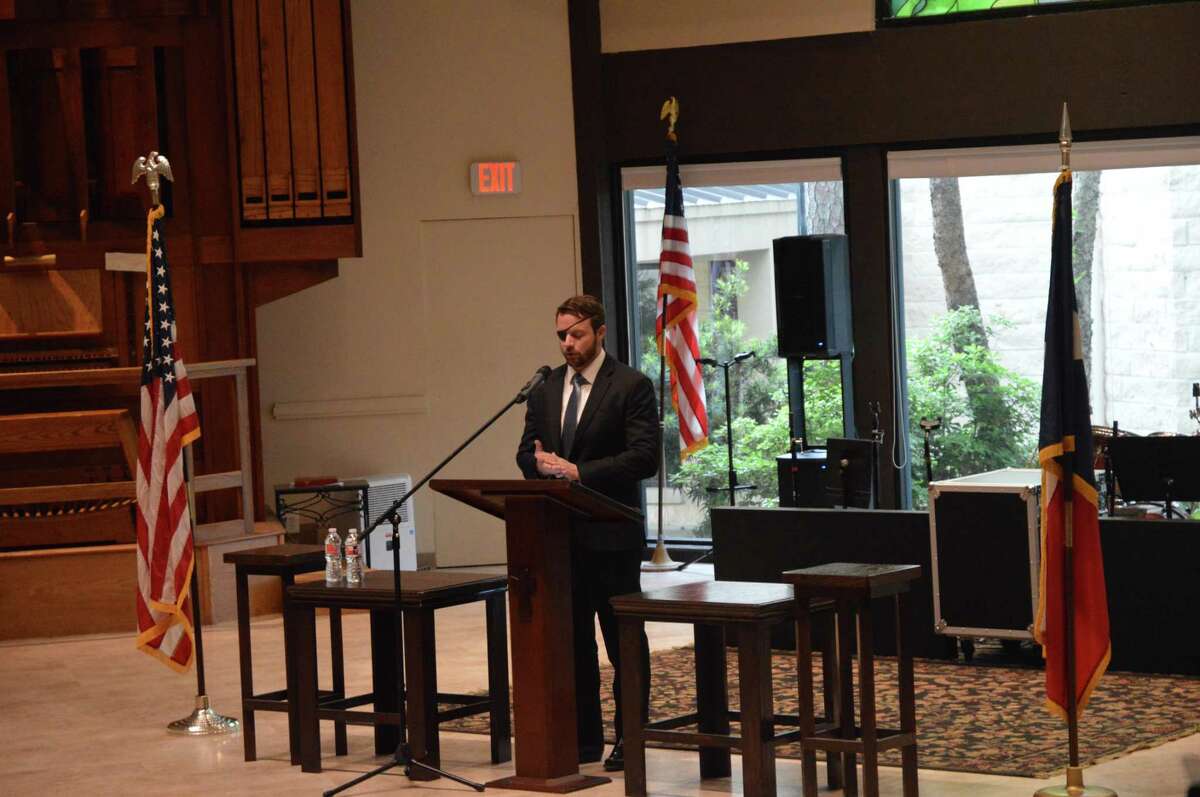 Congressman Dan Crenshaw speaks with Spring residents in northwest Harris County about efforts to fund flood mitigation projects on Tuesday, April 16, 2019.