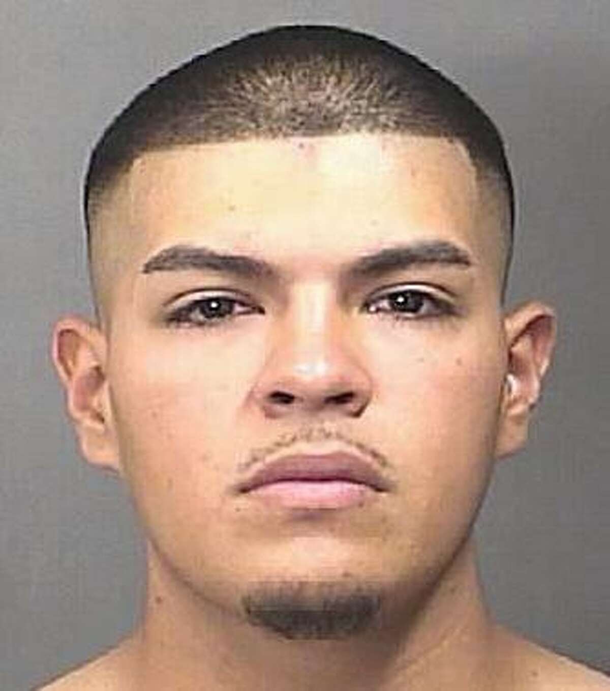 Brandon Alejandro Flores is accused in the execution-style slayings of two Baytown teenagers in 2015.