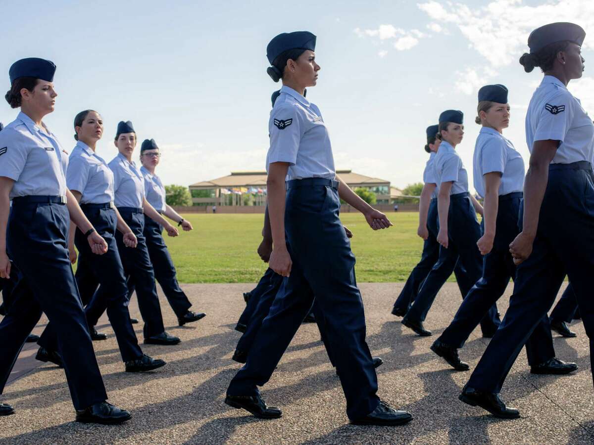 Newly graduated airmen march at Joint Base San Antonio-Lackland in 2019. That year, the Air Force saw the sharpest annual increase in reported sexual assaults among the four armed services, a Pentagon report released this week shows.