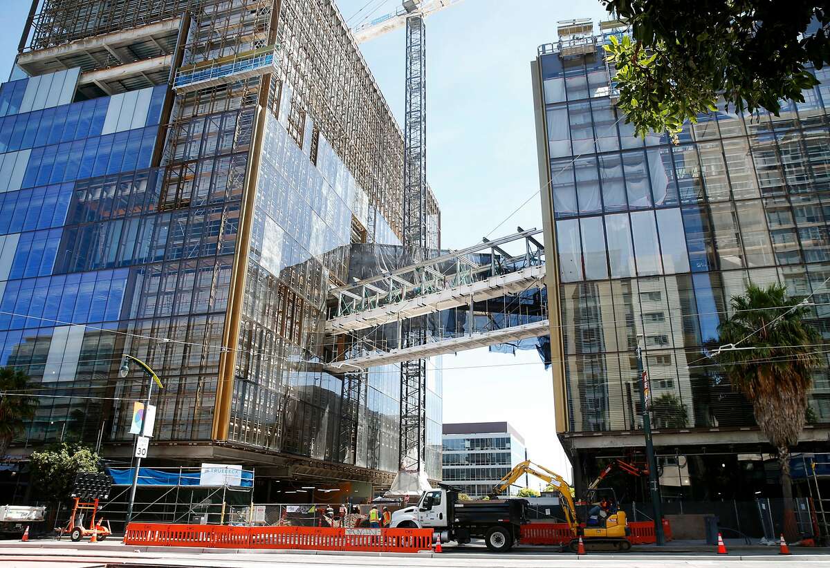 Elevated foot bridges connect two office buildings under construction that will be the world headquarters for Uber on Third Street near the Chase Center arena in San Francisco, Calif. on Thursday, April 18, 2019.