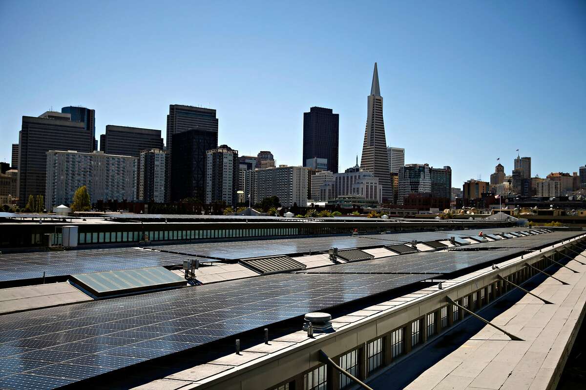Solar panels are seen on top of the new Exploratorium on Tuesday, April 9, 2013 in San Francisco, Calif. The 1.3-megawatt (AC) SunPower solar power system is designed to help the Exploratorium to achieve its �€˜net-zero energy�€™ goal. The system will generate 1.4 megawatts of DC, or direct current, electricity on the roof and use an inverter to convert it into 1.3 megawatts of AC, or alternating current, electricity for use in the building.