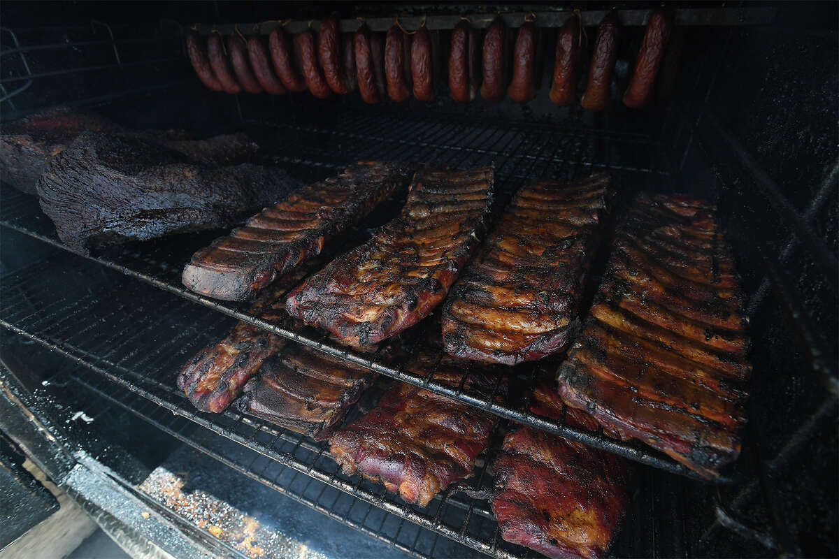Inside Charles Brewer's smoker at his barbecue restaurant in Beaumont Friday. Brewer's place Charlie's has been recognized by Texas Monthly and is on the magazine's midterm list of best barbecue in Texas. Photo taken Friday, 4/19/19