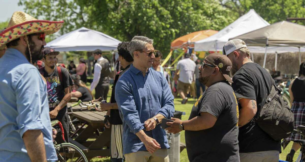 San Antonio Mayor Ron Nirenberg, speaks with constituents at a memorial remembering Tito Bradshaw who was struck and killed by an alleged drunk driver on Saturday, April 13, 2019.