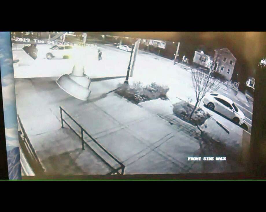 A slightly improved screenshot of the video posted by Fox 61 that shows another angle of shootout involving the police in New Haven, Connecticut. This new footage was posted by the press organization on Friday, April 19, 2019. The non-fatal shooting took place on Tuesday, April 16th. Photo: Contributed Photo / Contributed Photo / Connecticut Message Contribution