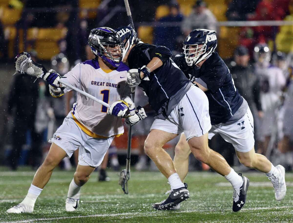 UAlbany attack Tehoka Nanticoke cradles the ball during a game against Yale on Friday, April 19, 2019 Casey Field in Albany, NY. (Phoebe Sheehan/Times Union)