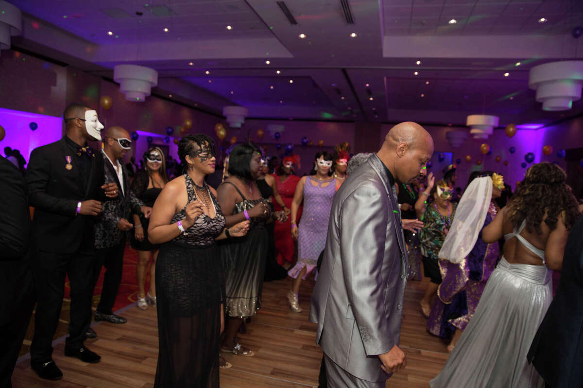 Photos Masks could not hide the Fiesta mood at the annual Masquerade Party