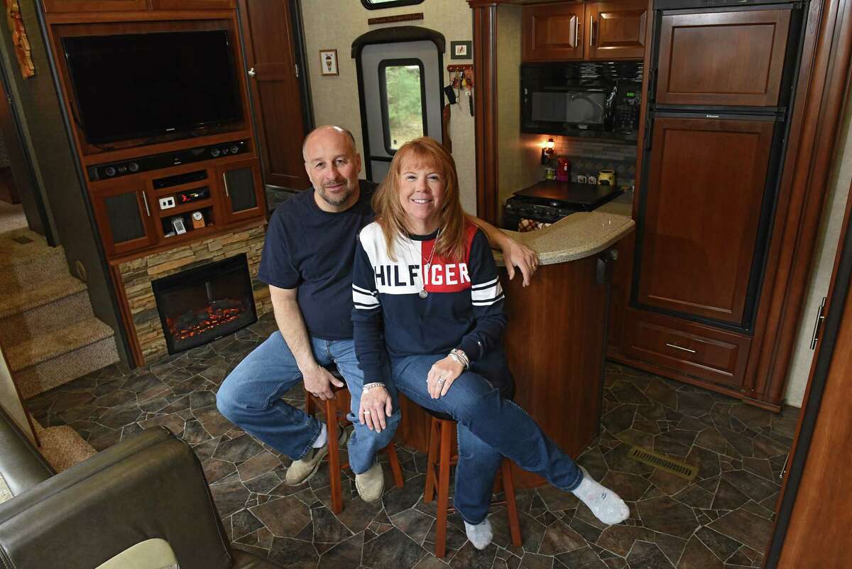 Cheryl Caza and her husband Rick sit in their RV on Friday, April 12, 2019 in Ballston Spa, N.Y. (Lori Van Buren/Times Union)