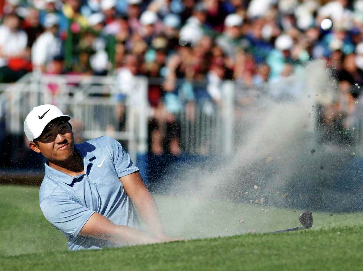 C.T. Pan blast out of a bunker on 17 during the final round of the RBC Heritage golf tournament at Harbour Town Golf Links on Hilton Head Island, S.C., Sunday, April 21, 2019. Pan won with a 12-under par for his first PGA victory. (AP Photo/Mic Smith)