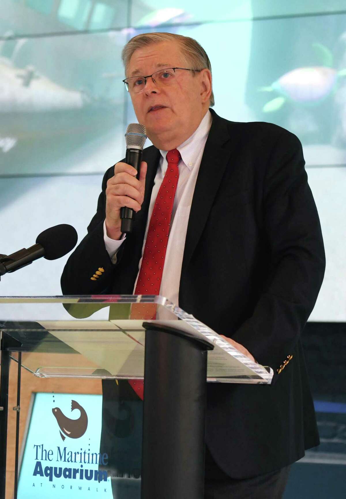 Stamford Mayor David Martin speaks during an Earth Day initiative press conference at the Martime Aquarium in Norwalk, Conn. Monday, April 22, 2019. Stamford and Norwalk leaders announced a plan to ban the use of single-use plastic straws and urged local businesses and residents to use more eco-friendly materials when possible.