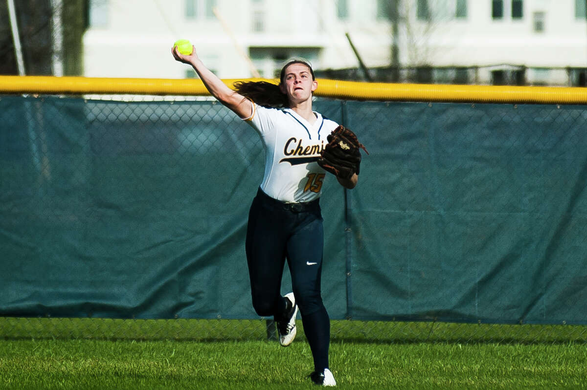 Midland's Sydney Miller throws the ball to a teammate during a game against Lapeer on Monday, April 22, 2019 at Midland High School. (Katy Kildee/kkildee@mdn.net)