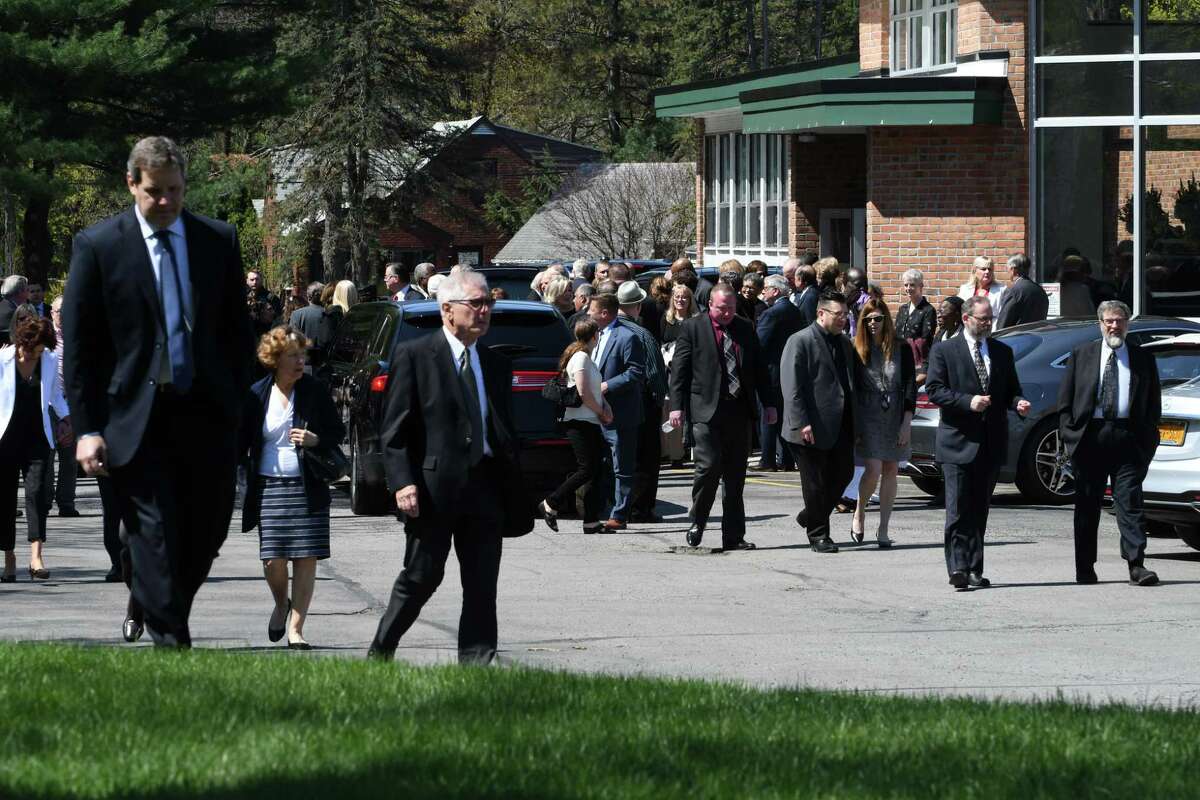 Mourners depart from Congregation Gates of Heaven following funeral services for local civic leader, educator and businesswoman Jane Golub on Tuesday, April 23, 2019, in Schenectady, N.Y. (Will Waldron/Times Union)