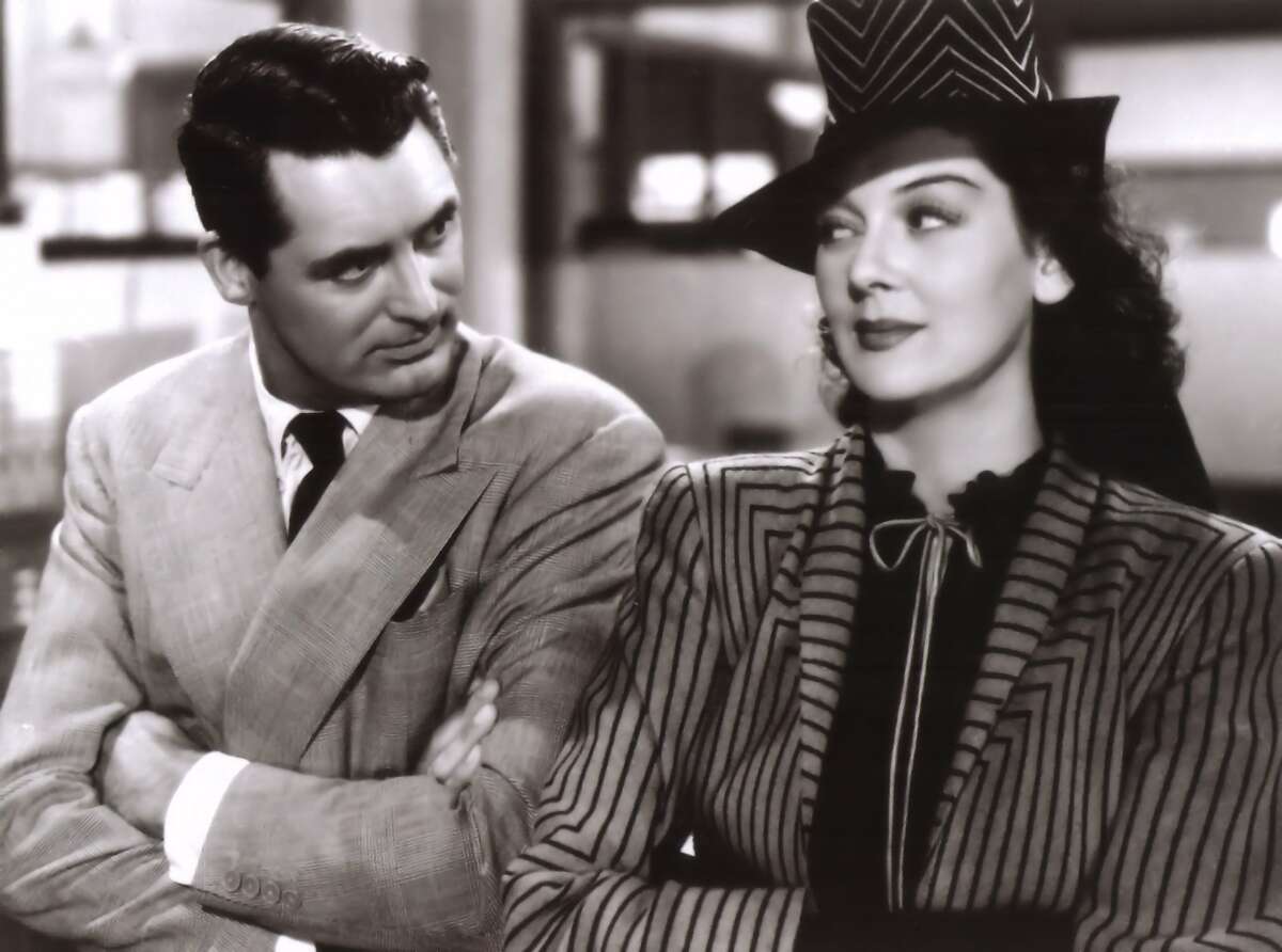 Cary Grant and Rosalind Russell in "His daughter Friday."