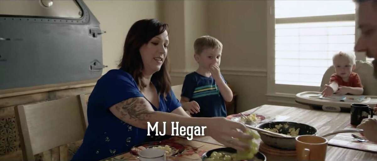 Democrat MJ Hegar’s biographic campaign video has more than 5 million views on YouTube and social media. It tells the story of the former Air Force pilot’s life, and her military service, including crash-landing a helicopter after it was shot down in Afghanistan. She was honored with the Purple Heart and the Distinguished Flying Cross. In this still image taken from the video, Hegar has breakfast with her two sons. In the background is a door from the helicopter that she crash-landed. She is running for Congress against 8-term incumbent Rep. John Carter of Round Roc
