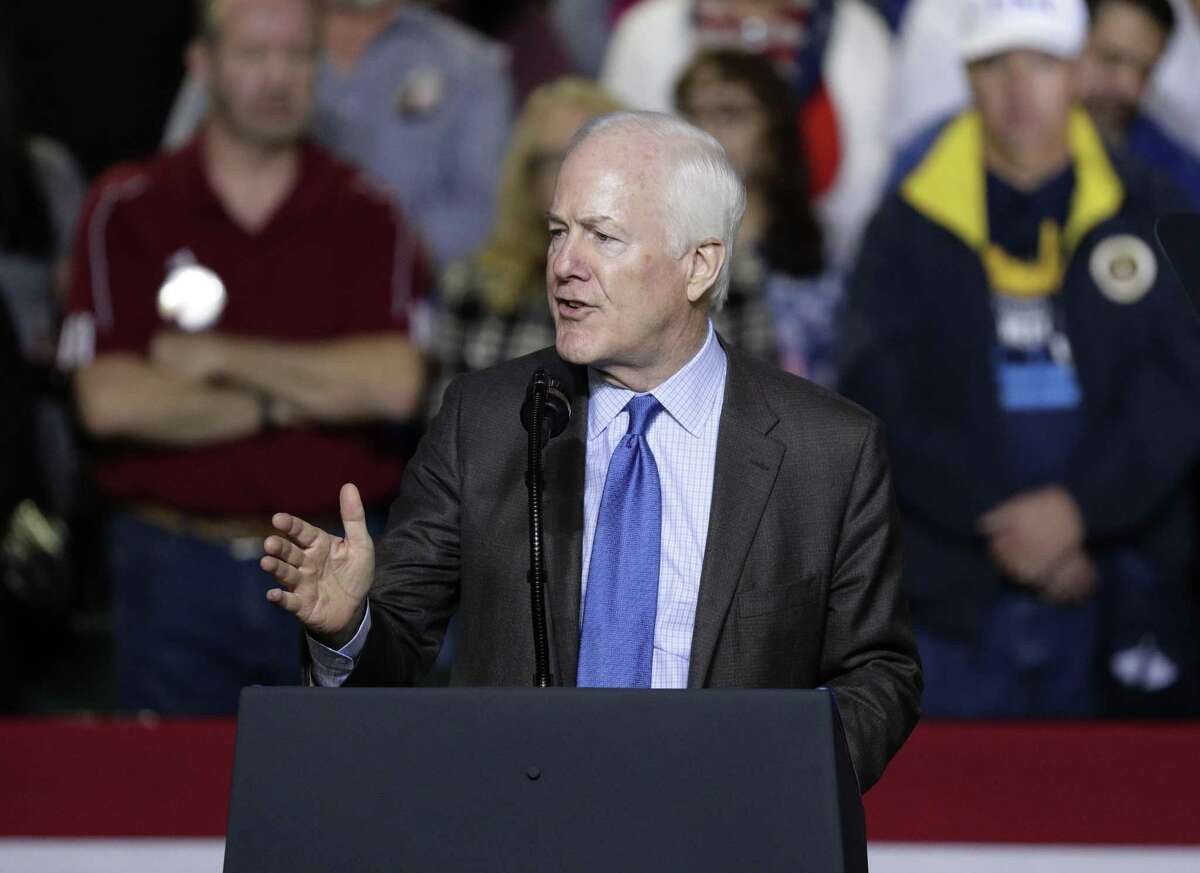 FILE - In this Feb. 11, 2019, file photo, Sen. John Cornyn, R-Texas, address a crowd at a rally for President Donald Trump at the El Paso County Coliseum in El Paso, Texas. Democrat MJ Hegar of Texas says she's running for U.S. Senate in 2020 against Republican incumbent Cornyn. (AP Photo/Eric Gay, File)