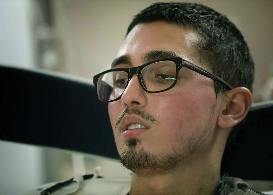 Dez Del Barba, 21, is hospitalized at the Army Institute of Surgical Research Burn Center in San Antonio for necrotizing fasciitis, a rare and aggressive bacterial infection. Photo: Bob Owen / ©2019 San Antonio Express-News