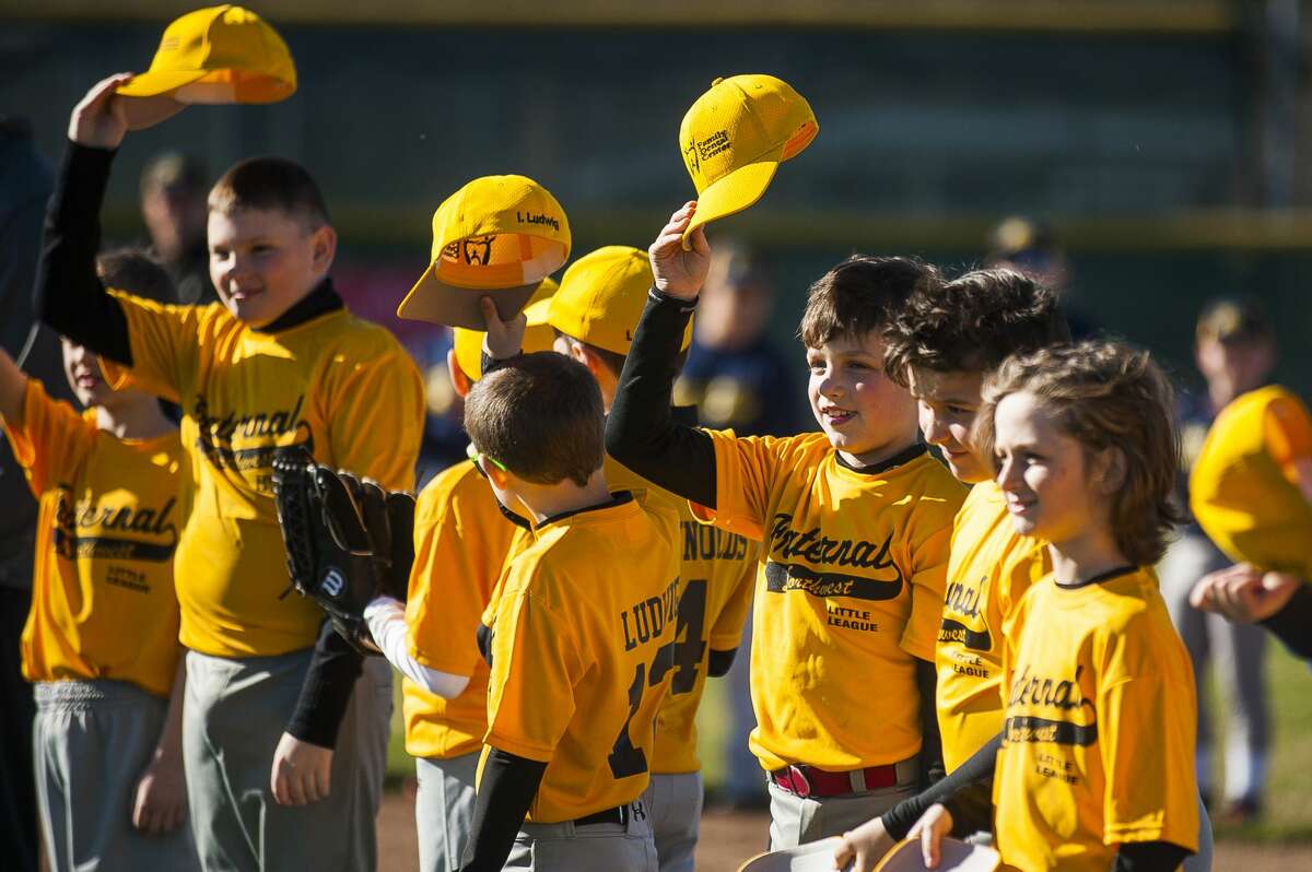 Fraternal Northwest Little League teams gather for an opening day ceremony on Tuesday, April 23, 2019 at the Sturgeon Road complex in Midland. (Katy Kildee/kkildee@mdn.net)