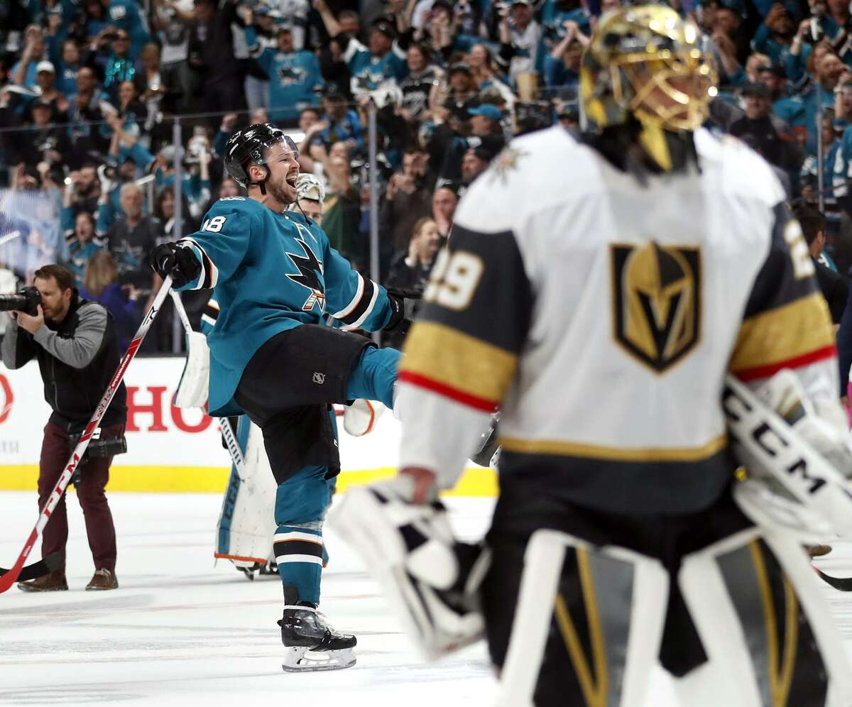 The Sharks’ Tomas Hertl (left) celebrates as Knights goalie Marc-Andre Fleury skates away after a 5-4 overtime win in Game 7 that catapulted San Jose into the second round of the playoffs.