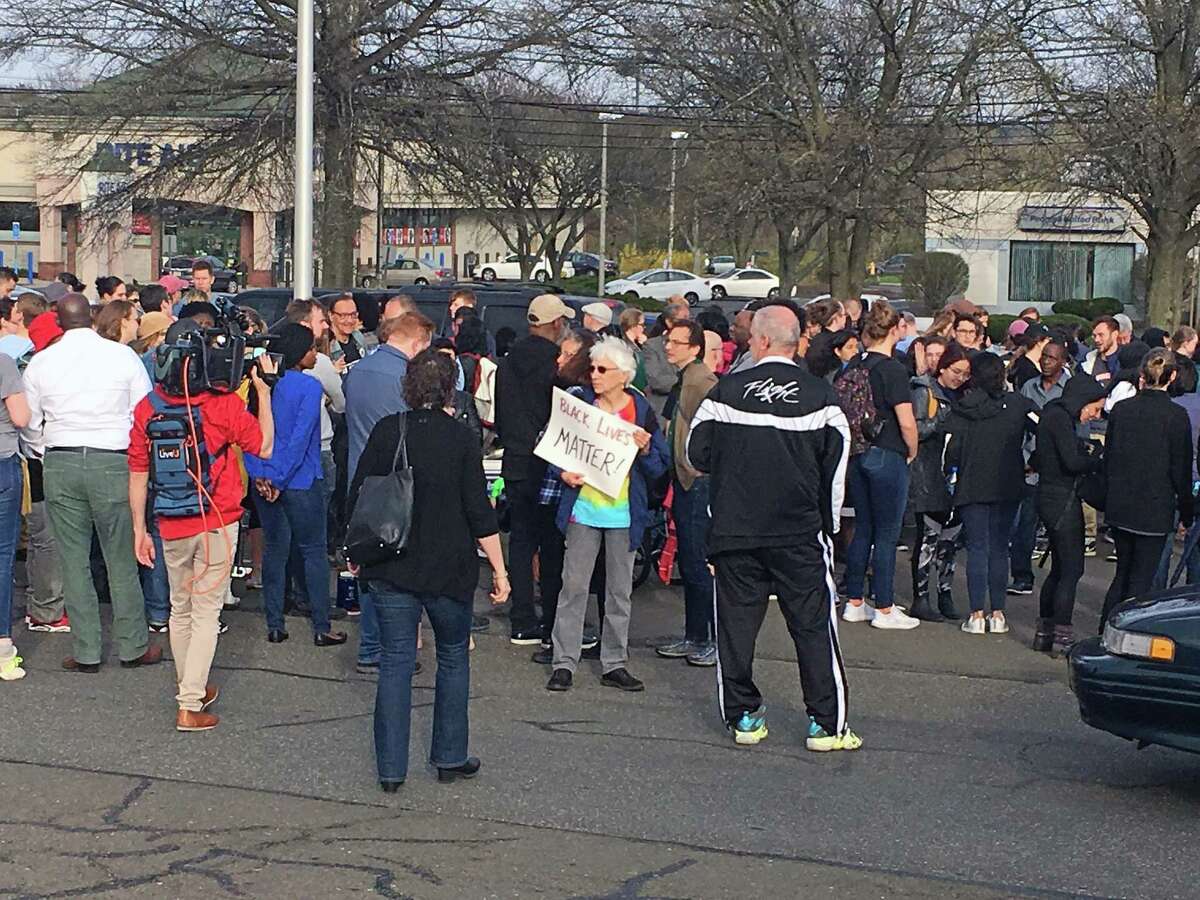 Protestors in Hamden, Conn., on April 19, 2019, in connection with the officer-involved shooting that involved a Hamden police officer and Yale officer.