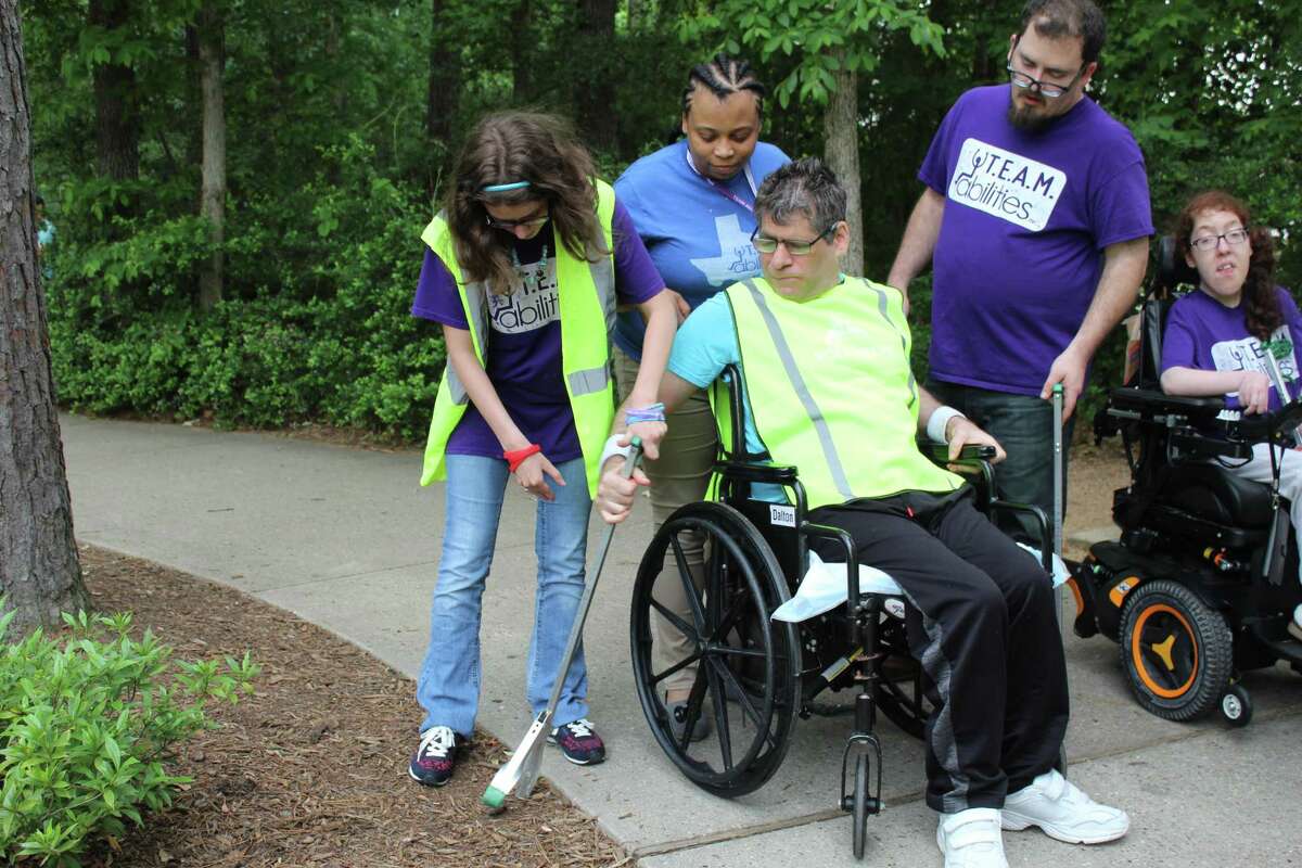 Over the course of a year, the TEAM Abilities special needs group visited parks around The Woodlands and decided to officially adopt Bear Branch Park as part of The Woodlands Township’s Adopt-A-Path program. They are one of nearly 70 groups that pick up litter in the township's pathways and parks.