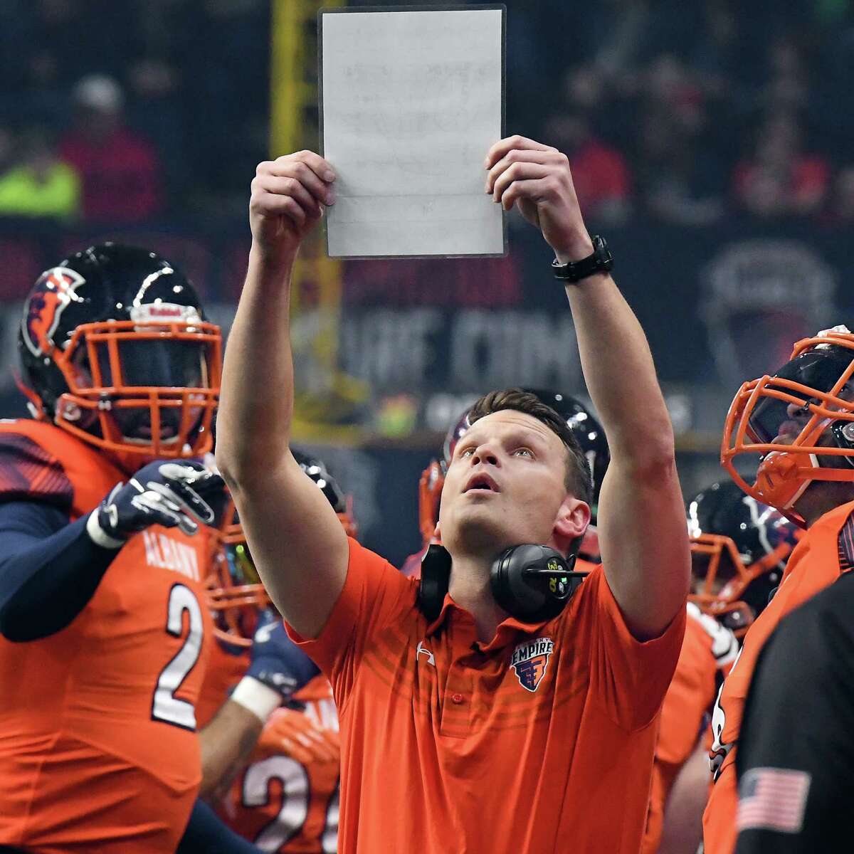 Albany Empire head coach Rob Keefe with players on the sidelines as they make their Arena Football League debut against the Philadelphia Soul to a packed house at the Times Union Center Saturday April 14, 2018 in Albany, NY. (John Carl D'Annibale/Times Union)