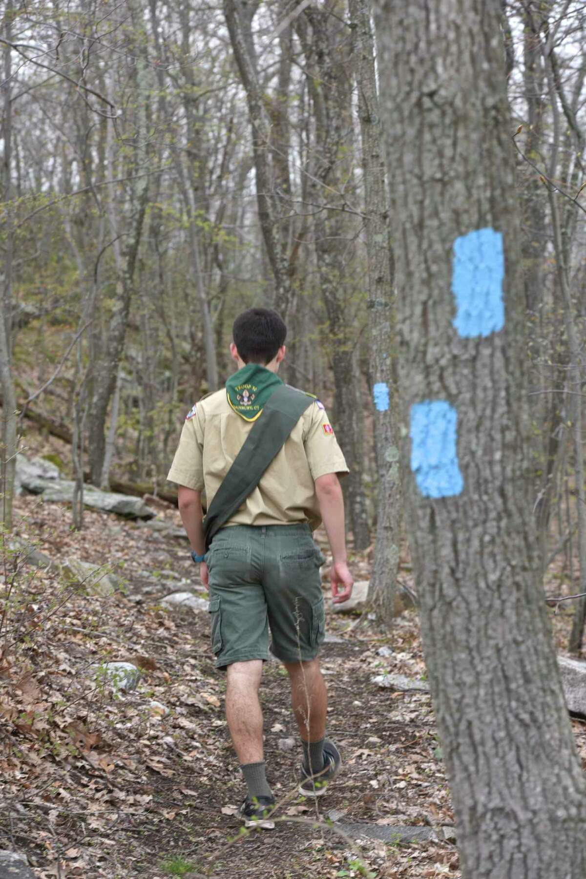 Alec Stanton has designed and built a new 0.7 mile loop trail at Richter Golf Course for his Eagle Scout project. The new trail, marked in blue, goes near Boggs Pond. Tuesday, April 23, 2019, in Danbury, Conn.