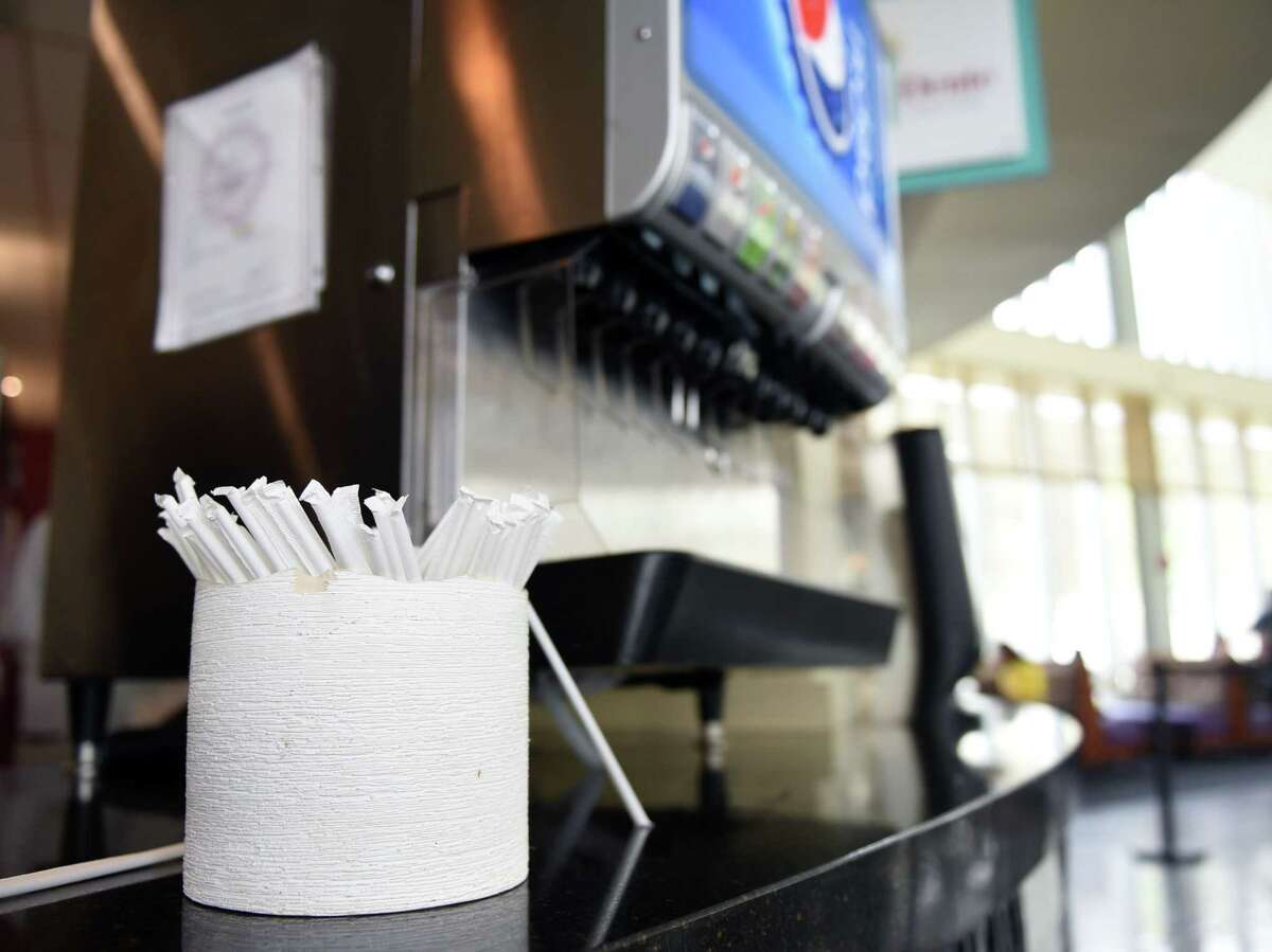 Straws sit next to a soda dispenser on Wednesday, April 24, 2019 at UAlbany's Student Center dining hall in Albany, NY. (Phoebe Sheehan/Times Union)