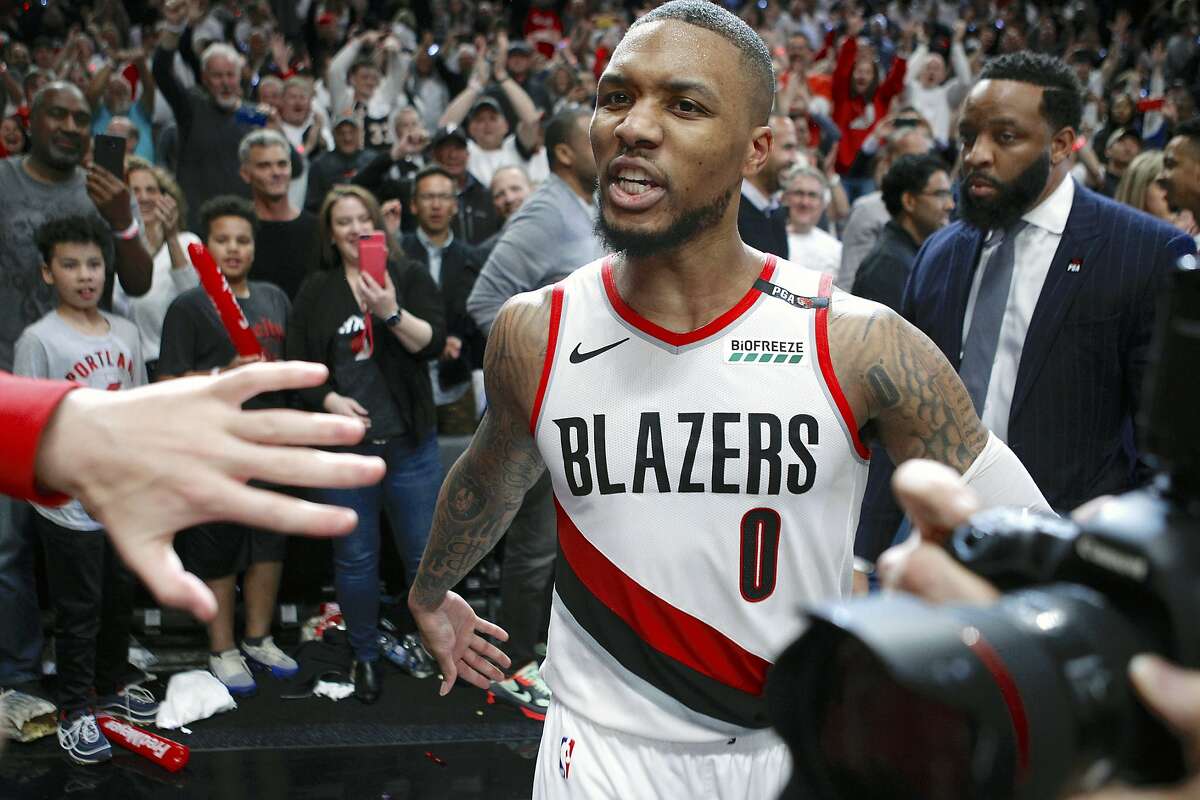 Portland Trail Blazers' Damian Lillard leaves the court after hitting the game-winning three-pointer to beat the Oklahoma City Thunder 118-115 in Game 5 of their best-of-seven first-round playoff series in Portland, Ore., Tuesday, April 23, 2019. Lillard finished with a franchise playoff-record 50 points and Portland eliminated Oklahoma City from the postseason. (Sean Meagher/The Oregonian via AP)