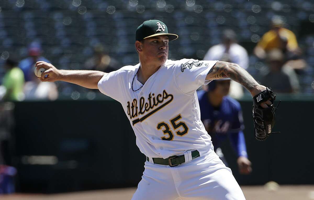 Oakland Athletics pitcher Aaron Brooks throws against the Texas Rangers during the first inning of a baseball game in Oakland, Calif., Wednesday, April 24, 2019. (AP Photo/Jeff Chiu)
