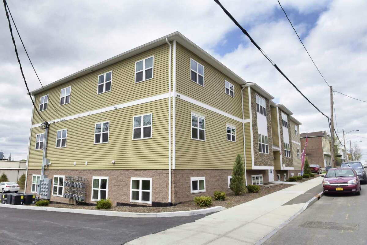 A view of the new 12-unit apartment building at 1047 Broadway on Wednesday, April 24, 2019, in Rensselaer, N.Y. This apartment, which was new construction built on an empty lot, is the first of three planned new construction apartment buildings on Broadway. The two-bedroom, roughly 970 square-feet apartments come with granite countertops and stainless steel appliances. (Paul Buckowski/Times Union)