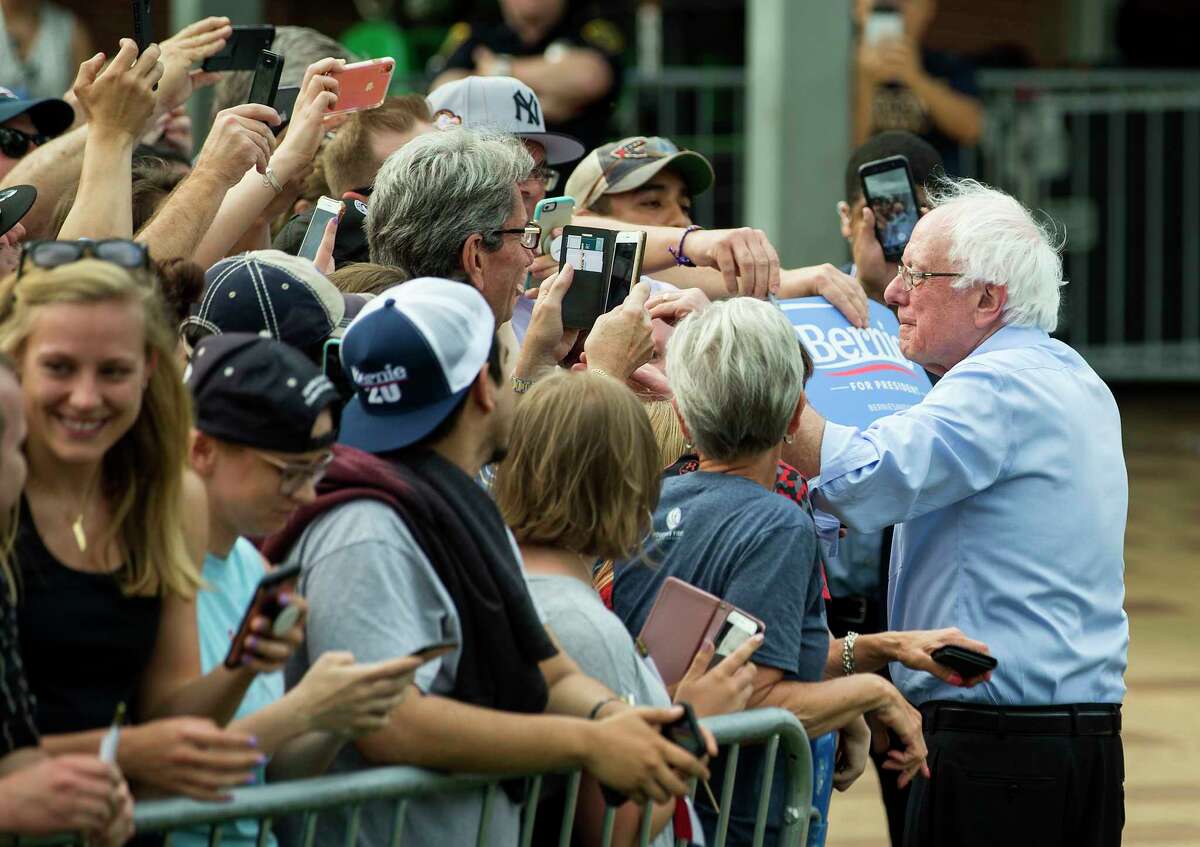 Democratic presidential hopeful Sen. Bernie Sanders shakes hands with supporters following a rally at Discovery Green on Wednesday, April 24, 2019, in Houston.