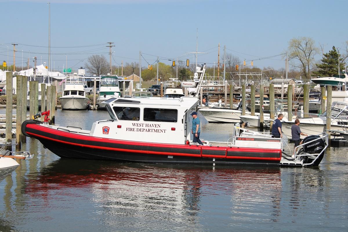 Two rescued off West Haven shore hours after boat capsized, police say