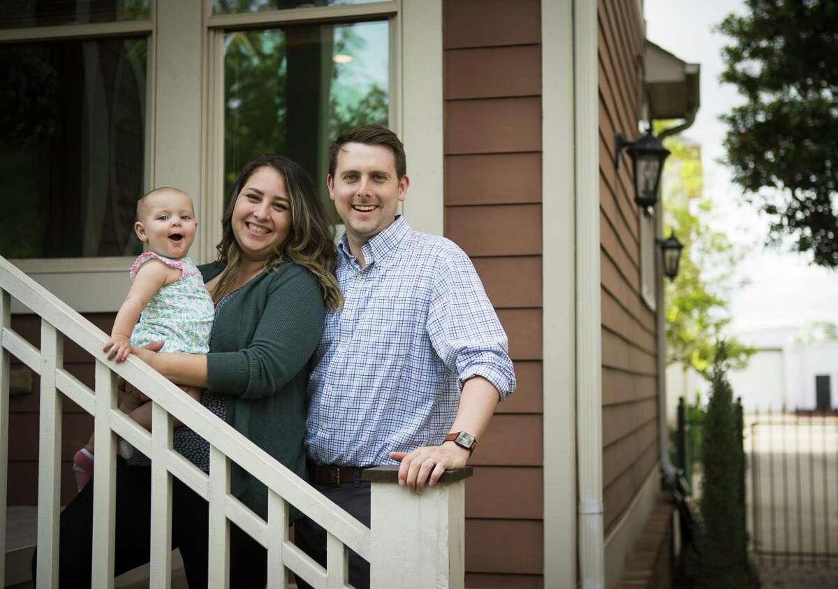 Shaina and Josh Pherigo and their 1-year-old daughter, Bailey, recently bought their first home in the Shady Acres neighborhood of Houston, Monday, April 22, 2019. The home was built ten-years-ago, and it was on the market for a year before the Pherigo's purchased it as their first home earlier this year.