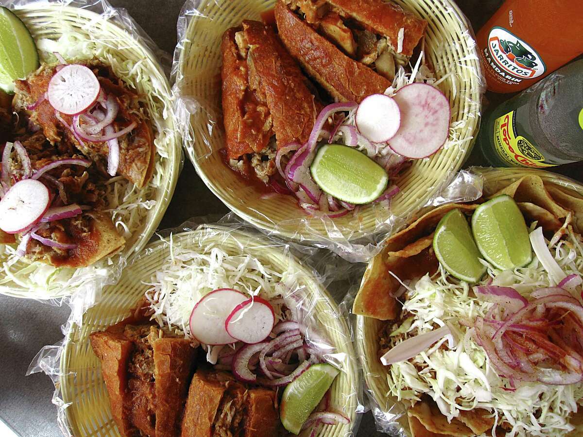 The menu at Ro-Ho Pork & Bread includes, clockwise from top left, tacos dorados with carnitas, a torta ahogada with pork stomach called buche, nachos with carnitas and buche and the signature torta ahogada with pork carnitas.