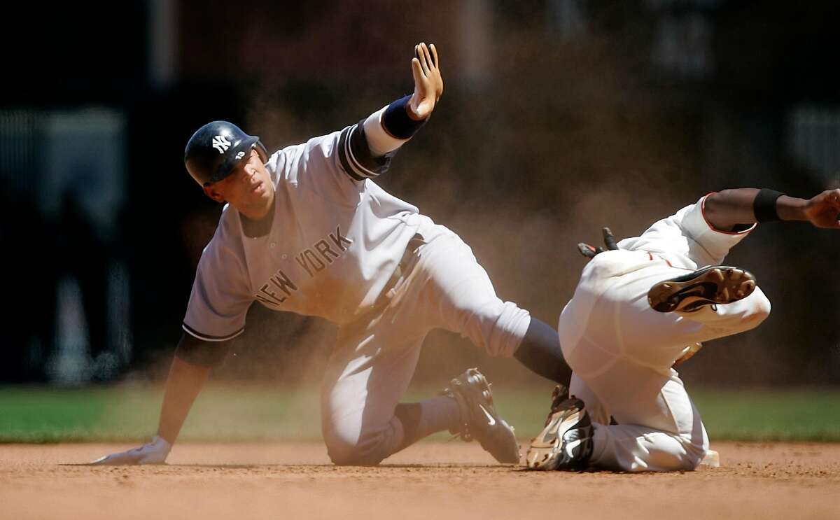 giants_0438_df.jpg Alex Rodriguez is safe stealing 2nd in the 7th as Ray Durham tries to make the play. The San Francisco Giants beat the New York Yankees in 13 innings at AT&T Park. Photographed in San Francisco on 6/23/07. Deanne Fitzmaurice / The Chronicle Ran on: 06-24-2007 Nate Schierholtz is mobbed by teammates after his 13th-inning run-scoring single ended the Giants eight-game losing streak. Ran on: 06-24-2007 Omar Vizquel (13) is atop the group of Giants mobbing Nate Schierholtz after his 13th-inning single ended the Giants eight-game skid.