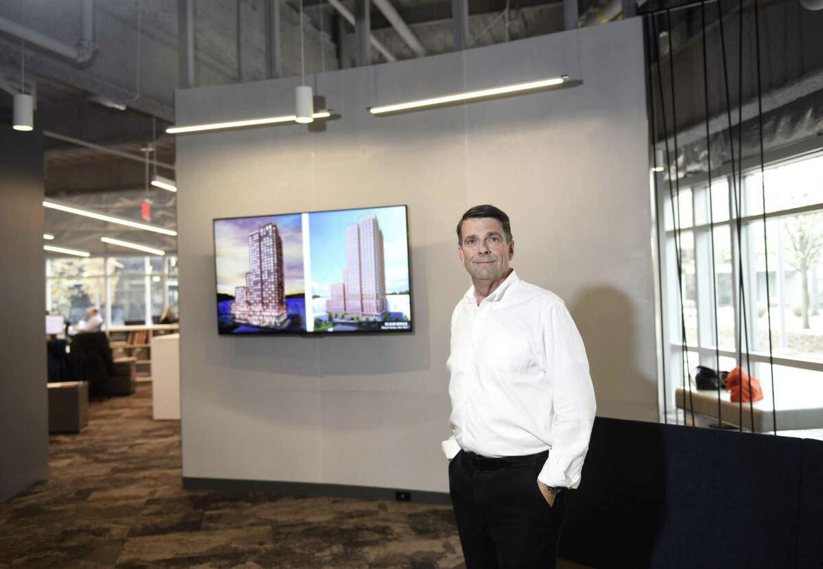 Perkins Eastman Principal Mark Creedon poses in the hospitality area inside the new Perkins Eastman offices at 677 Washington Blvd., in downtown Stamford, Conn., on Monday, April 22, 2019.