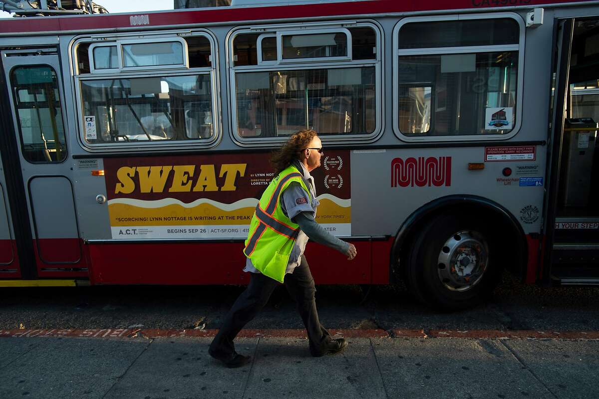 Muni driver Michelle Moore returns to her bus after a break on Thursday, Sept. 13, 2018, in San Francisco