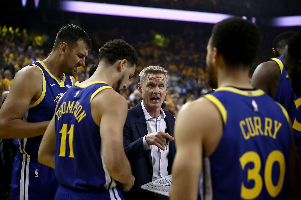 OAKLAND, CALIFORNIA - APRIL 24: Head coach Steve Kerr of the Golden State Warriors talks to his team before playing against the LA Clippers in Game Five of the first round of the 2019 NBA Western Conference Playoffs at ORACLE Arena on April 24, 2019 in Oakland, California. NOTE TO USER: User expressly acknowledges and agrees that, by downloading and or using this photograph, User is consenting to the terms and conditions of the Getty Images License Agreement. (Photo by Ezra Shaw/Getty Images)