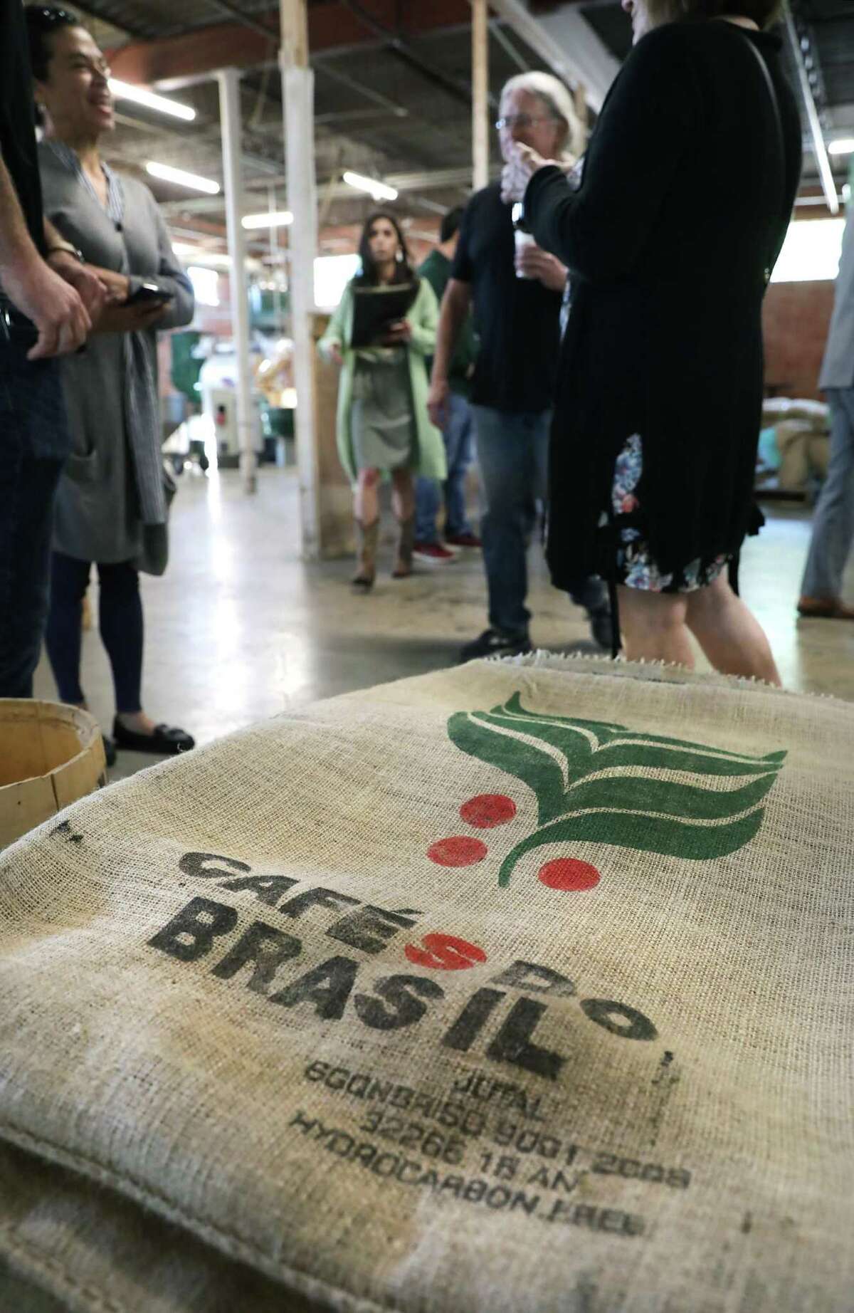 Small business owners gathered at What's Brewing Coffee Roasters on April 25, 2019. Coffee roasters are concerned about the effects of climate change on coffee crops around the world.