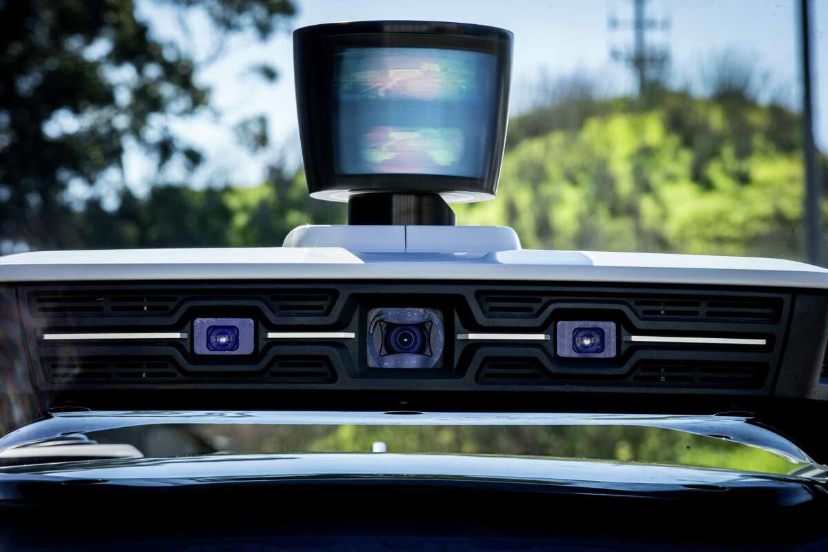 Uber's LiDAR system and front cameras on top of the Volvo XC90 outside the Uber Advanced Technologies Group Headquarters at Pier 70, Tuesday, March 6, 2018, in San Francisco, Calif.