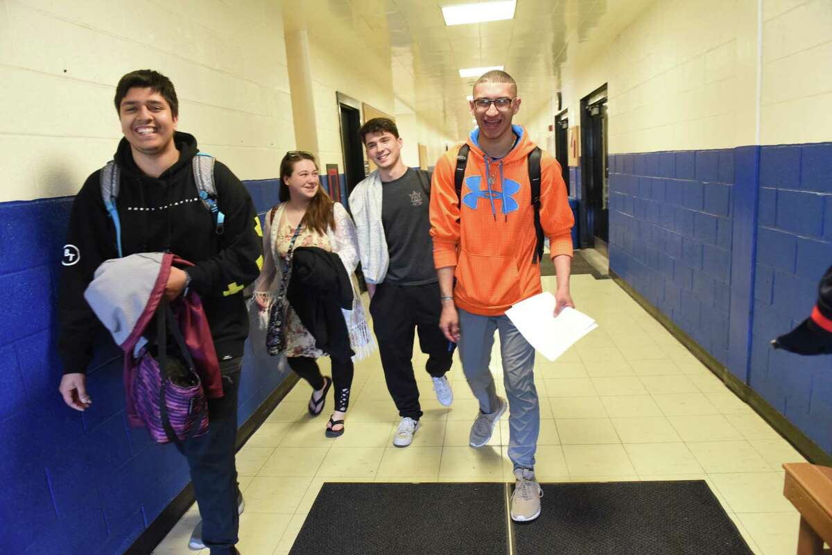 From left, P-Tech students Owais Husain, Monique Beam, Nick Brasmeister and Marcos Santiago from the Hamilton Fulton Montgomery BOCES program walk to class at Fulton Montgomery Community College on Thursday, April 25, 2019 in Johnstown, N.Y. (Lori Van Buren/Times Union)