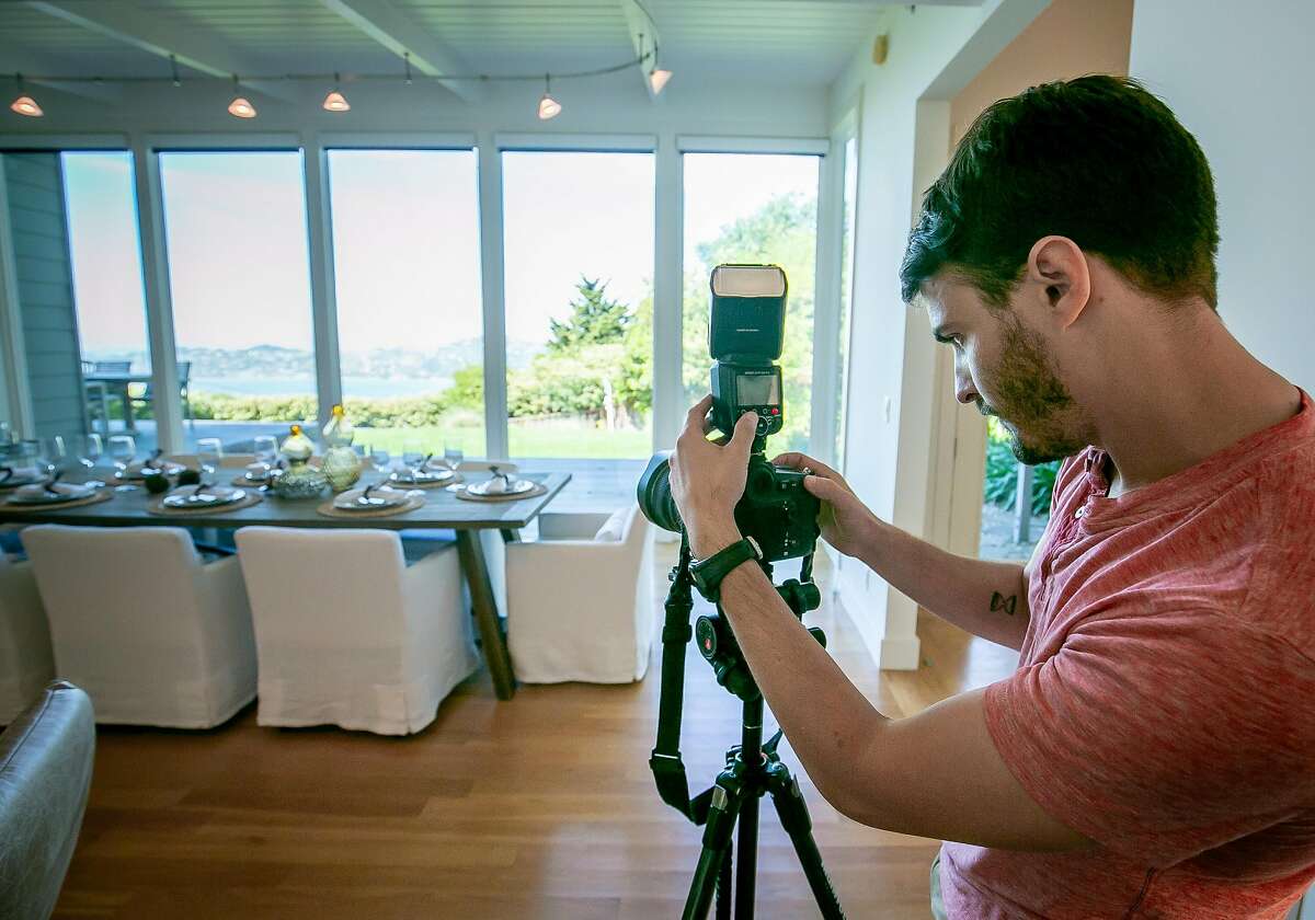 Photographer Danny Osterweil shoots a house for sale with his drone in Sausalito, Calif. on April 25, 2019.