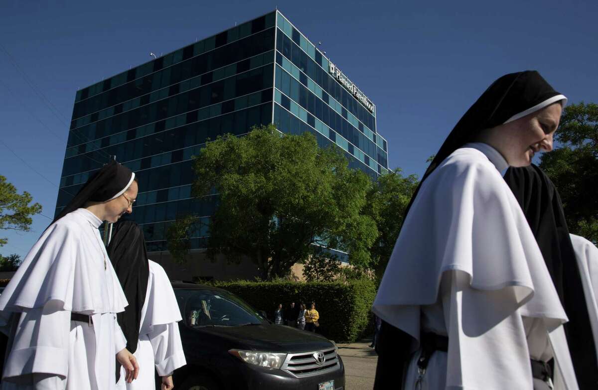 Dominican Sisters of Mary, Mother of the Eucharist protest abortion outside the Planned Parenthood building at 4600 Gulf Freeway Friday, April 19, 2019, in Houston.