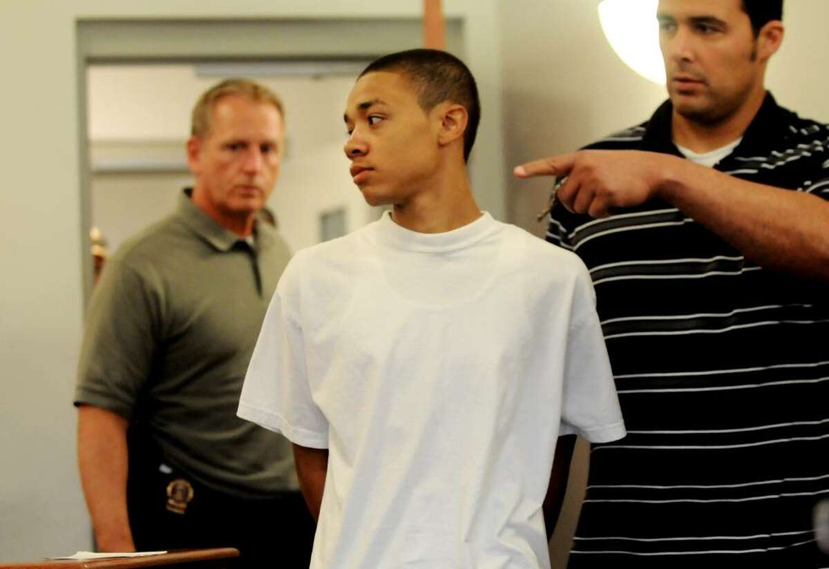 Kemo Santana, 18, enters Troy City Court for his arraignment Tuesday. (Cindy Schultz / Times Union)
