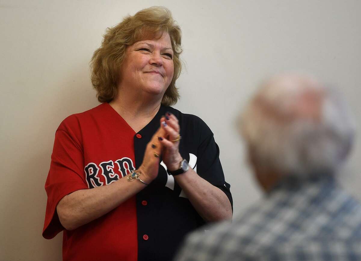 Linda Ruth Tosetti of Durham, granddaughter of baseball great Babe Ruth, meets with the Silver Sluggers group of baseball fans at the Derby Public Library Thursday.