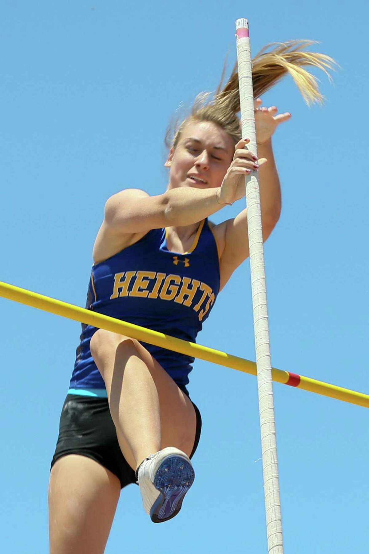 Alamo Heights' Alina Borawski attempts to clear the bar at 11" 0" during the first day of the Region IV-5A track and field meet at Heroes Stadium on Friday, April 26, 2019. Borawski finished second in the event with a vault of 10'9".