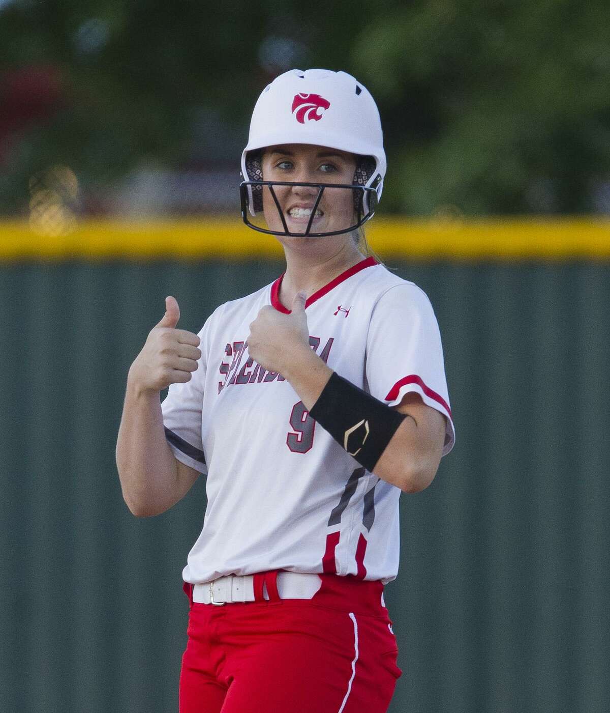 Gracie Bumpurs of Splendora gives a thumbs-up after hitting an RBI double in the third inning against Hardin-Jefferson on Friday.
