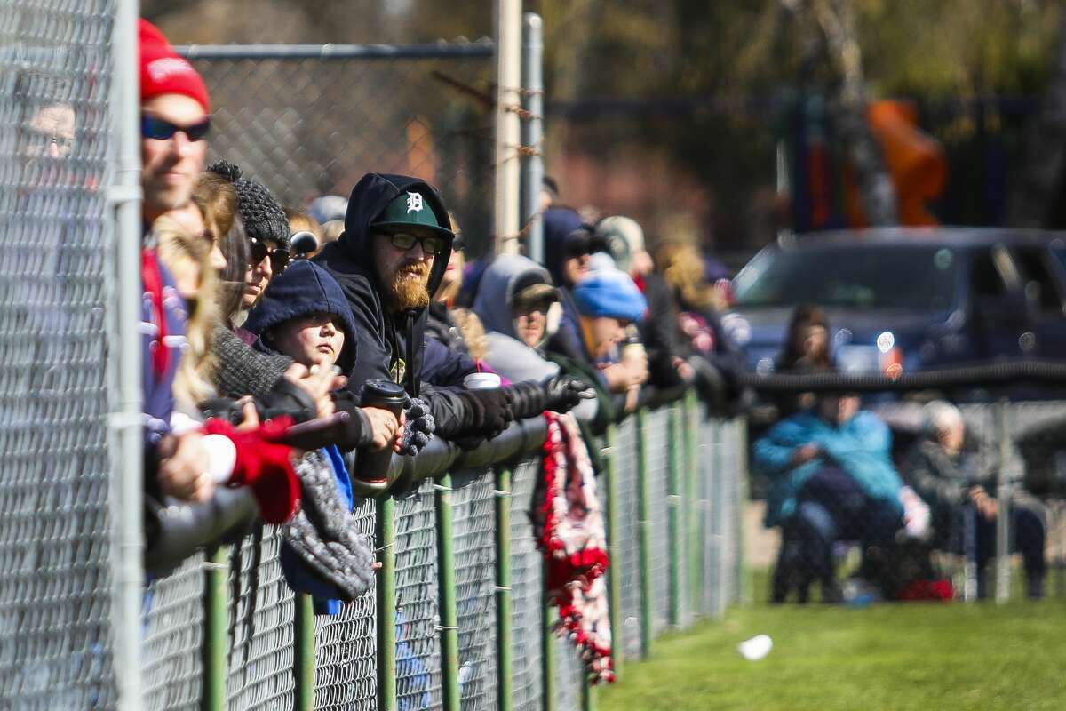 Northeast Little League teams gather for an opening day ceremony on Saturday, April 27, 2019 at Plymouth Park. (Katy Kildee/kkildee@mdn.net)