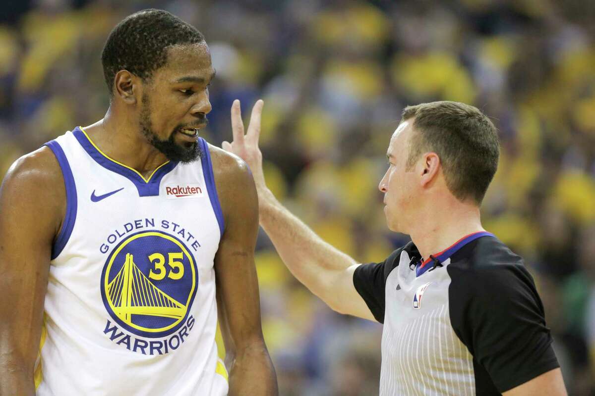 Golden State Warriors forward Kevin Durant (35) is unhappy about a call in the first half of Game 1 of the NBA playoffs at the Oracle Arena on Sunday, April 28, 2019 in Oakland.